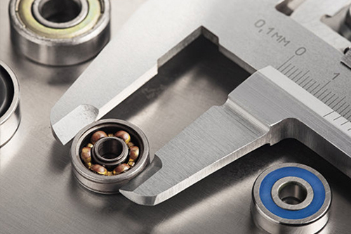 When is deep groove ball bearings more suitable for oil change?